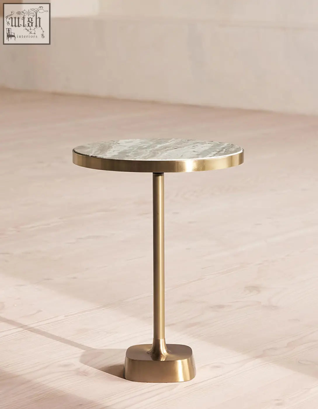 Bozkurt side table with polished green marble top and brass base offers great table features and financing options