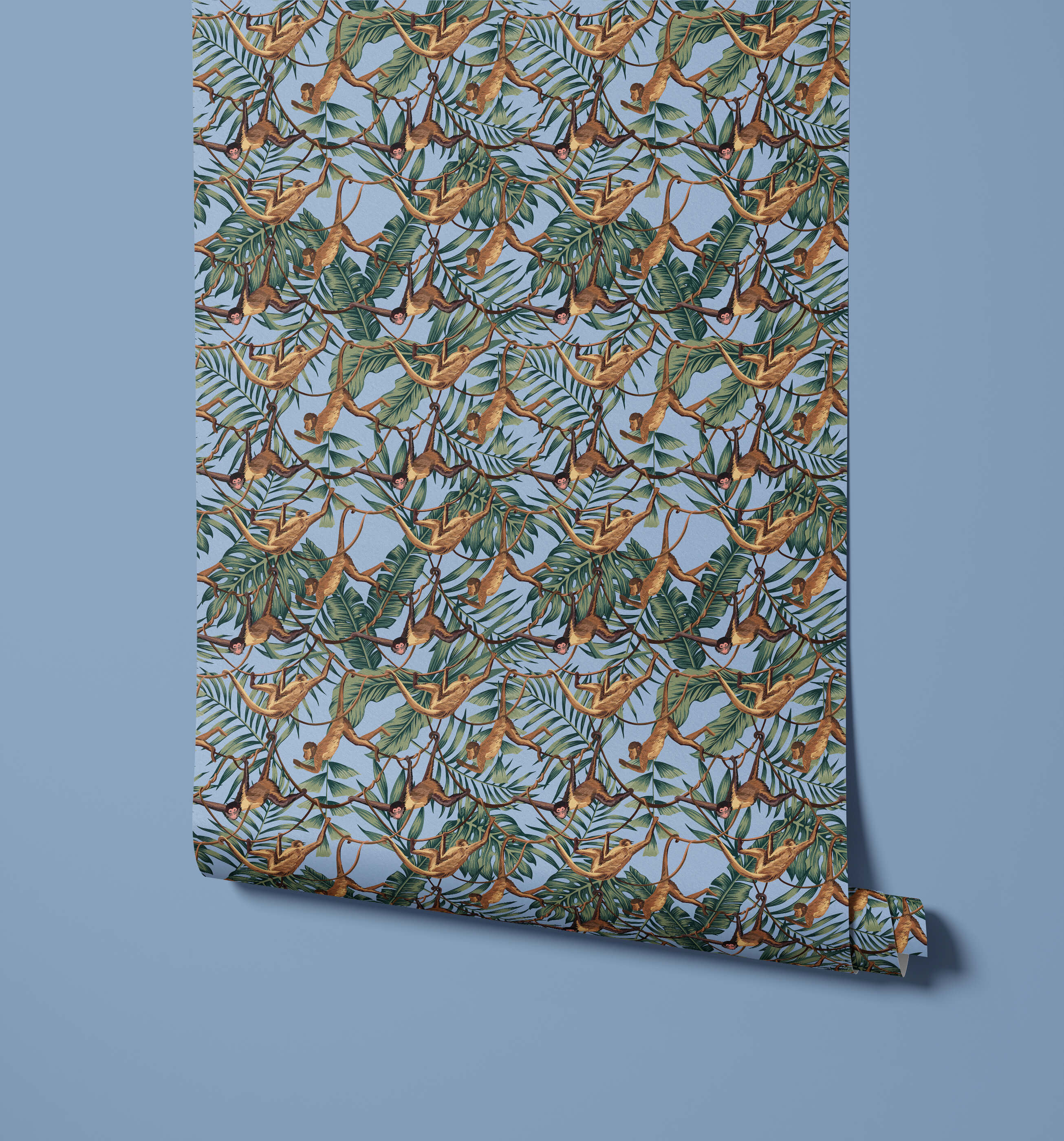 A roll of bradley light blue wallpaper with brown monkeys hanging from green tropical leaves pattern