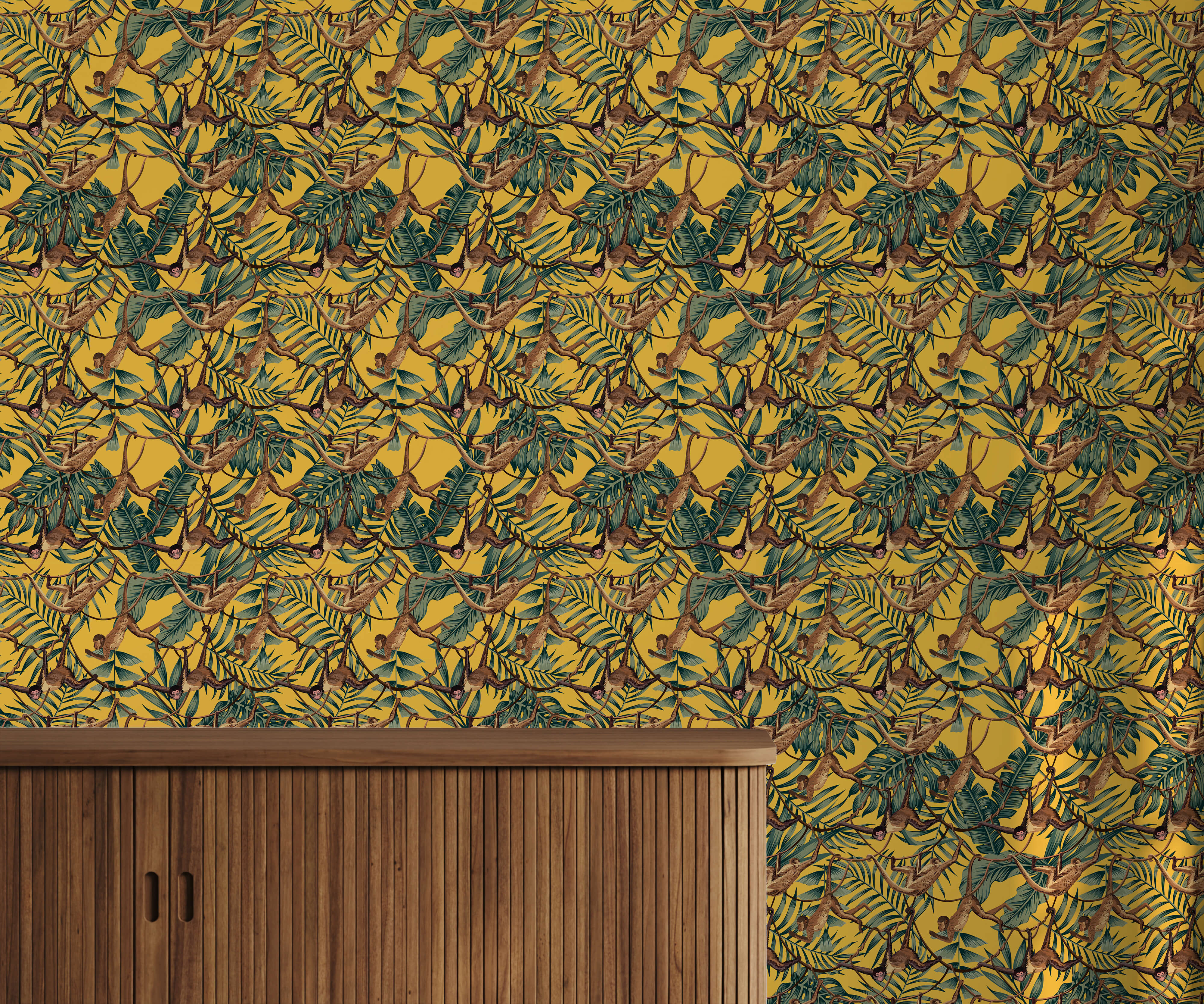 Bright yellow bradley wallpaper with green tropical leaves and brown monkeys swinging in dense repeating pattern