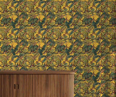 Bright yellow bradley wallpaper with green tropical leaves and brown monkeys swinging in dense repeating pattern