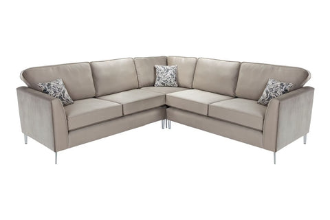 Beige upholstered brampton corner sofa with silver legs and patterned throw pillows offers custom options