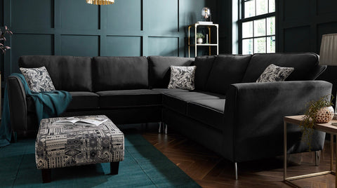Black velvet brampton corner sofa with silver metal legs and black and white throw pillows featuring custom options