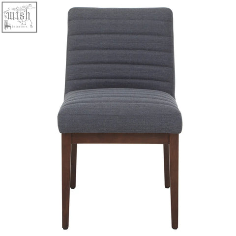 Dark gray upholstered Brando charcoal grey dining chair with vertical ribbed texture and oak legs