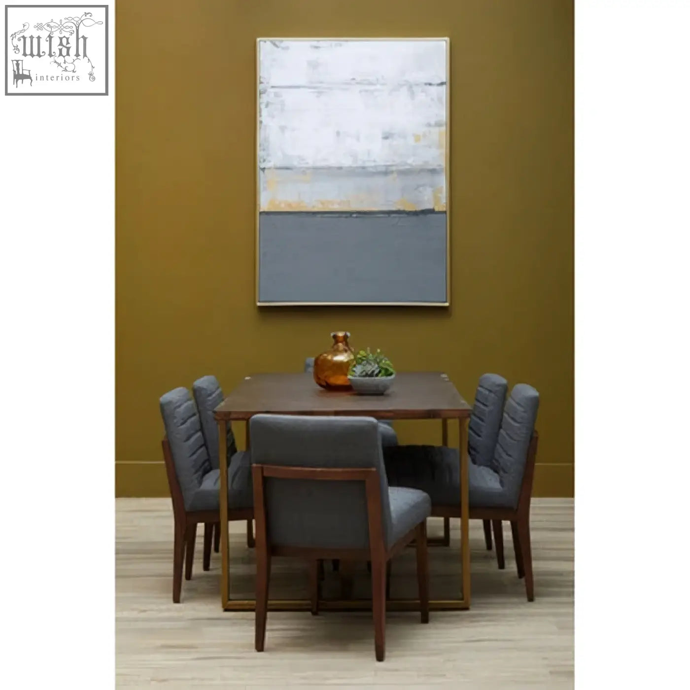 Modern dining set with charcoal grey dining chairs featuring oak legs and a dark wood table with metal legs