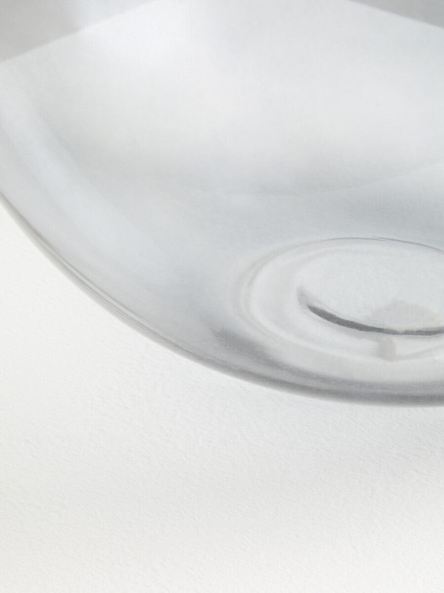 Clear glass vase bree grey glass with smooth curved rim and subtle concentric circular patterns near the base