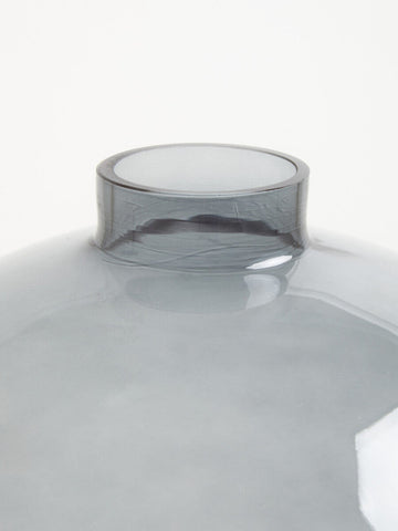Bree grey glass vase made of translucent grey glass with a smooth rounded body and slightly flared rim