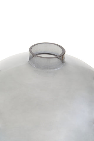 Transparent plastic lid with a circular raised rim for bree grey glass vase made of grey glass