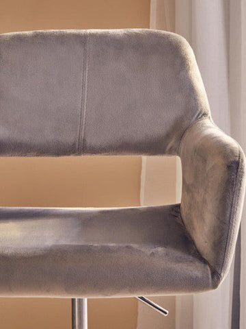 Gray velvet bar stool with sleek modern design and chrome base perfect for home office chair setup