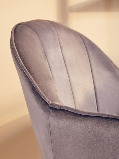 Back of a Brent grey velvet and gold base home office chair with plush pleated slate-gray velvet upholstery