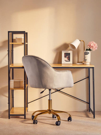 Gray velvet home office chair with gold tone base and casters perfect for stylish office setups