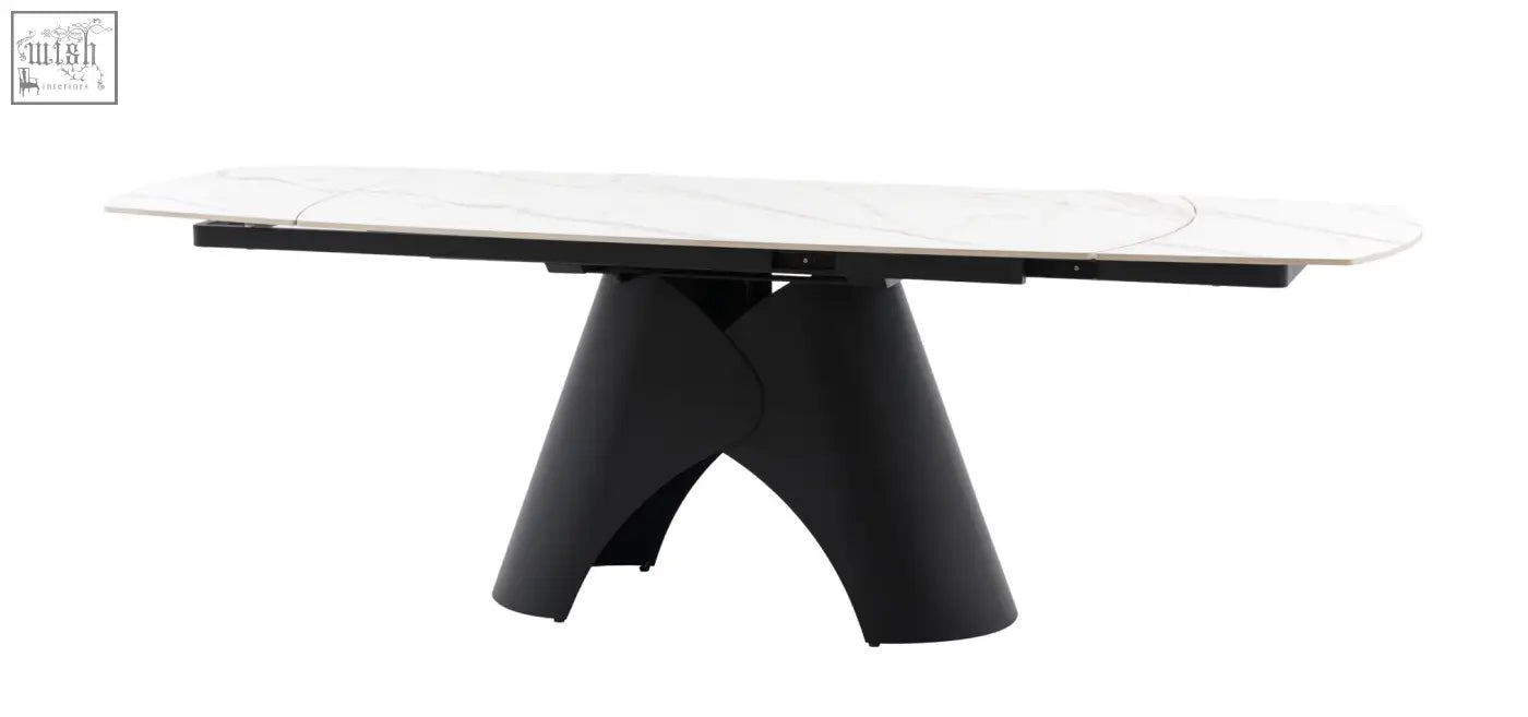 Modern black pedestal dining table with a white marble style ceramic top brezzo extendable dining table
