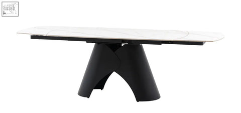 Modern black pedestal dining table with a white marble style ceramic top brezzo extendable dining table