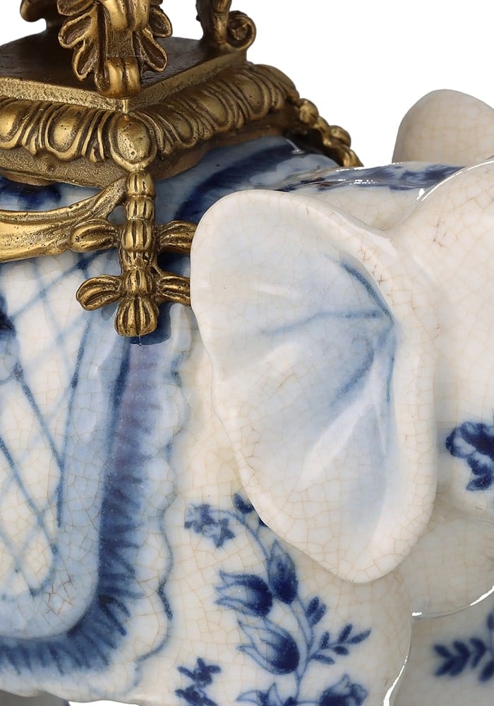 Blue and white porcelain bridgerton decorative elephant bowl with gold-toned ornate metal accents