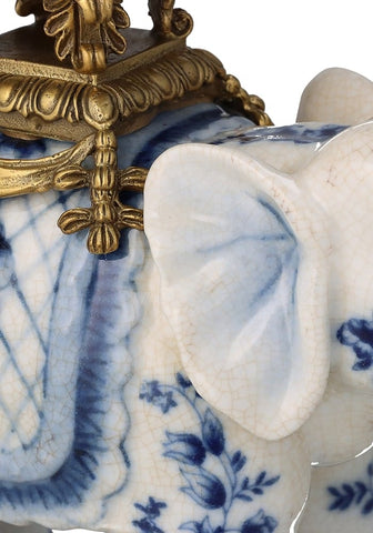 Blue and white porcelain bridgerton decorative elephant bowl with gold-toned ornate metal accents