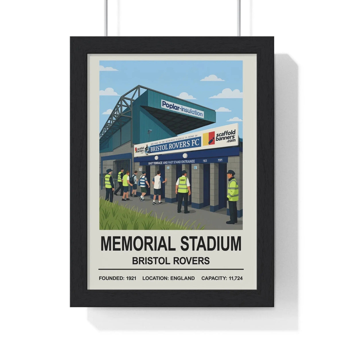 Black-framed memorial stadium print featuring bristol rovers stadium entrance with blue white stripes and capacity details