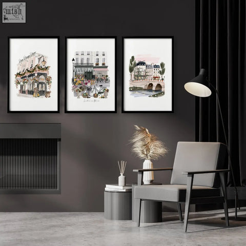 Three framed british posters art prints of parisian street scenes hang on a dark gray wall travel wall art set of 3