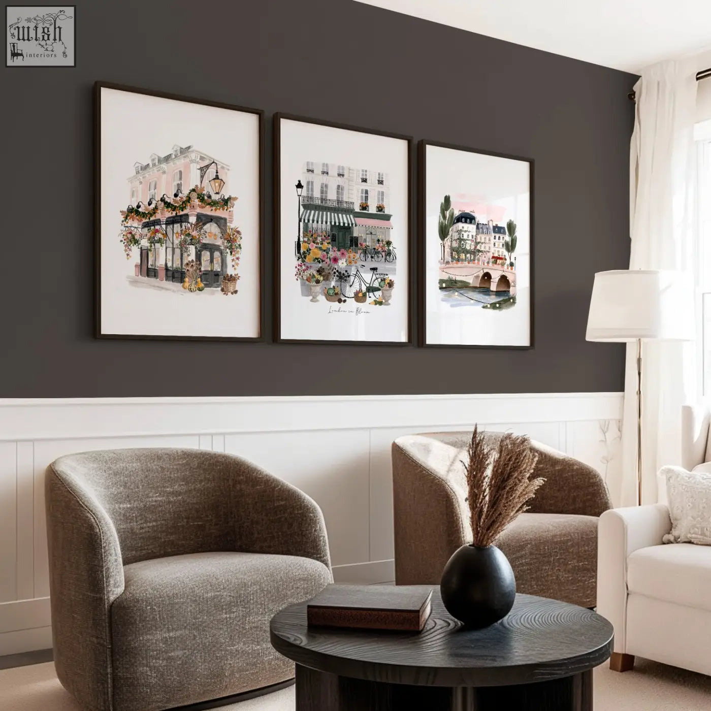 Black matte ceramic vase with dried pampas grass paired with british posters london in bloom travel wall art prints
