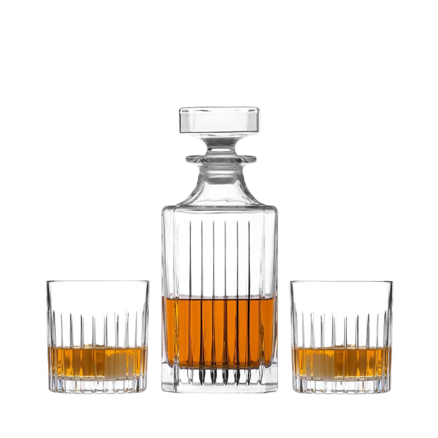 Clear glass whisky decanter set with vertical ridges and matching stopper, includes two ribbed tumblers in gift box