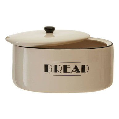 Cream-colored ceramic broadway bread bin with black lid knob and bold bread print for kitchen storage