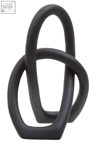 Broc black knot sculpture is a black ceramic abstract piece with interlocking looped forms for modern decor