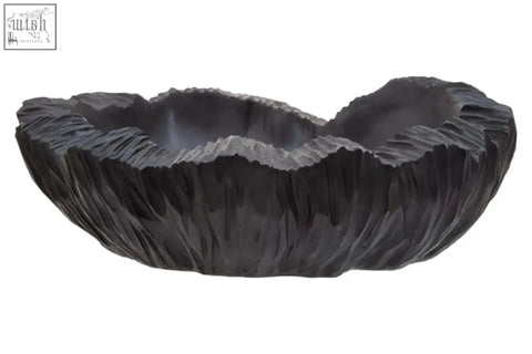 Dark gray intricately carved wooden broc curved textured black bowl with leaf-like textured black rim