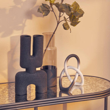 Dark gray textured ceramic vase with modern y shaped design in ombre black white knot sculpture style