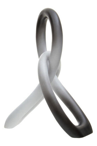 A sleek broc ombre black and white knot sculpture with a smooth glossy finish and gradient gray ribbon design