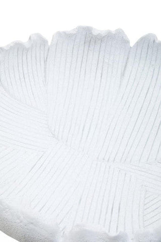 White textured bowl broc made of ceramic with a ribbed surface and scalloped rim for stylish serving