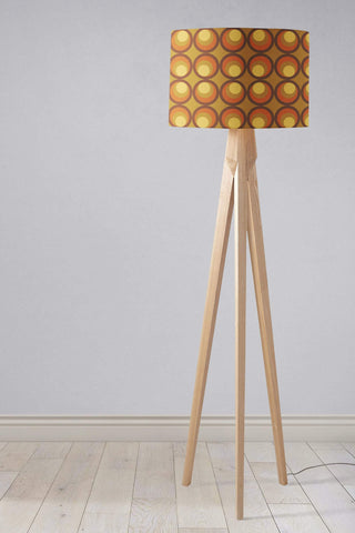 Brown and orange retro 1970s table lamp with cylindrical lamp shade and slender wooden lamp base