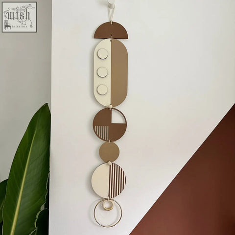Brown modern wall art featuring layered wooden geometric shapes in earthy tones perfect for minimalist home decor