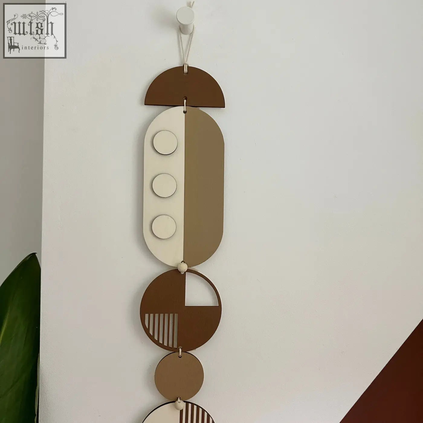 Brown modern wall art featuring layered wooden geometric shapes in earthy tones perfect for minimalist home decor