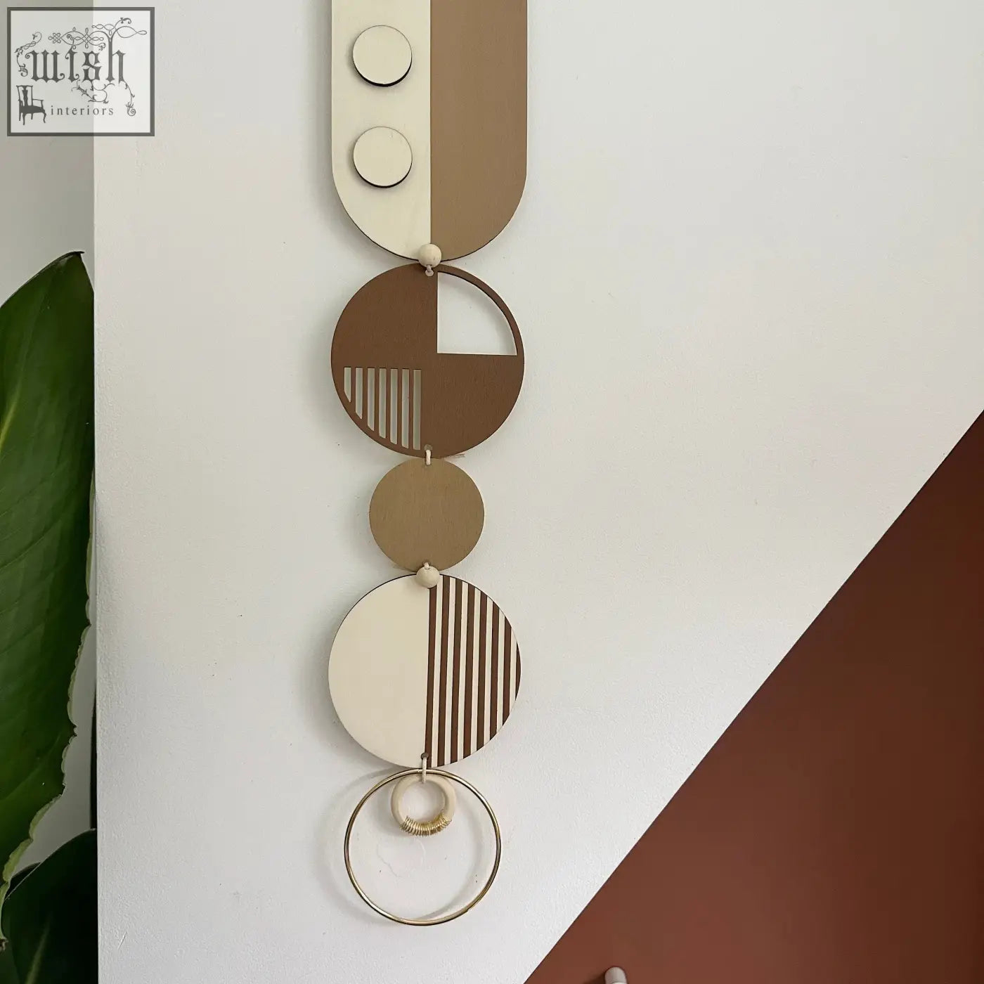 Brown modern wall art featuring geometric stacked circles in beige and tan tones perfect for minimalist home decor