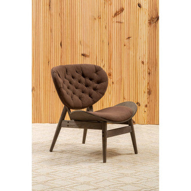 Brown tufted leather armchair with dark elm wood legs and frame perfect for cozy living spaces