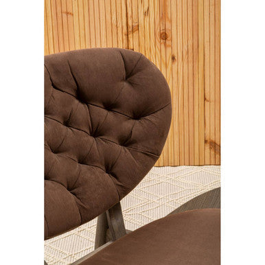 Brown velvet chair with rounded tufted backrest and dark elm wood frame perfect for cozy seating