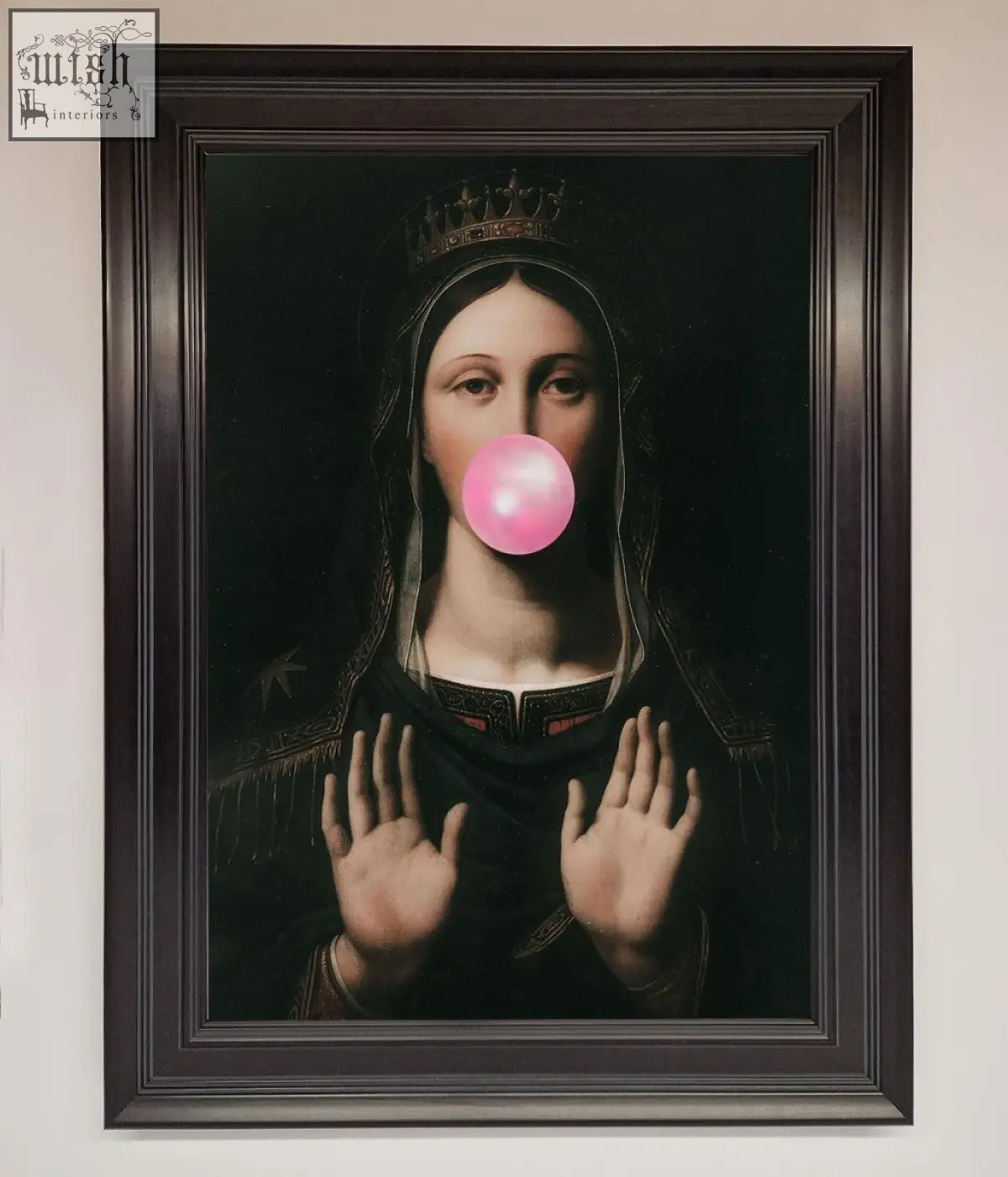 A framed bubble gum renaissance print showing a classical crowned portrait blowing a bright pink bubblegum bubble