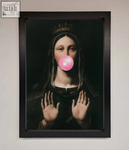 A framed print of bubble gum renaissance artwork showing a crowned figure blowing a pink bubblegum bubble in dark tones