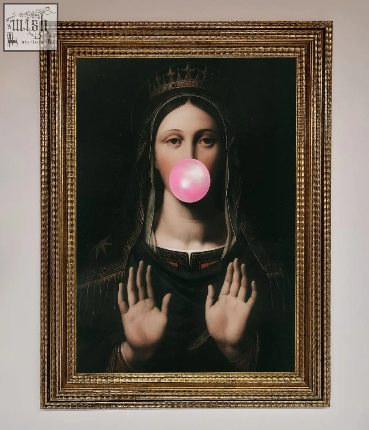 A framed bubble gum renaissance print showing the virgin mary in dark robes blowing a bright pink bubble gum bubble
