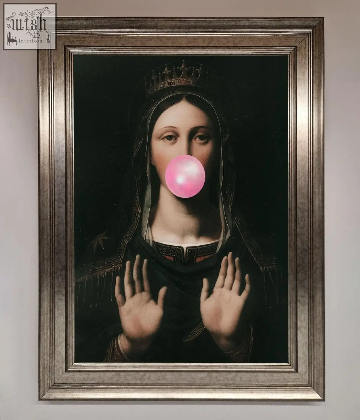 A framed print of a bubble gum renaissance artwork showing a crowned figure blowing a bright pink bubblegum bubble