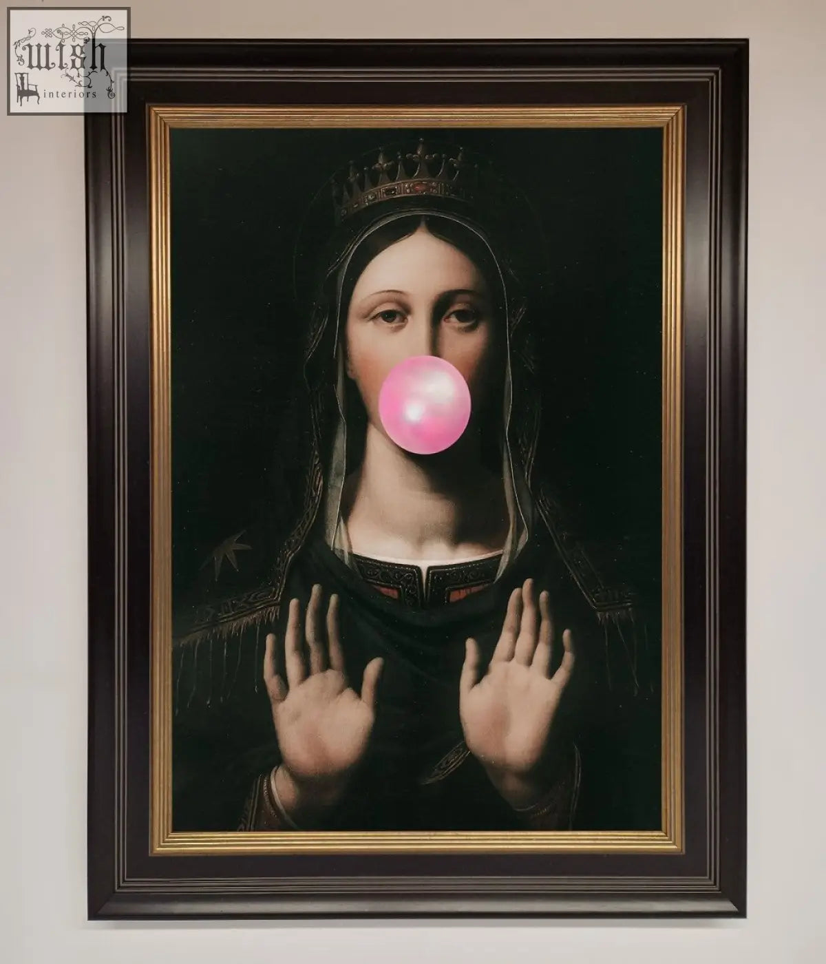 A framed bubble gum renaissance print showing a regal figure in dark clothes blowing a bright pink bubblegum bubble