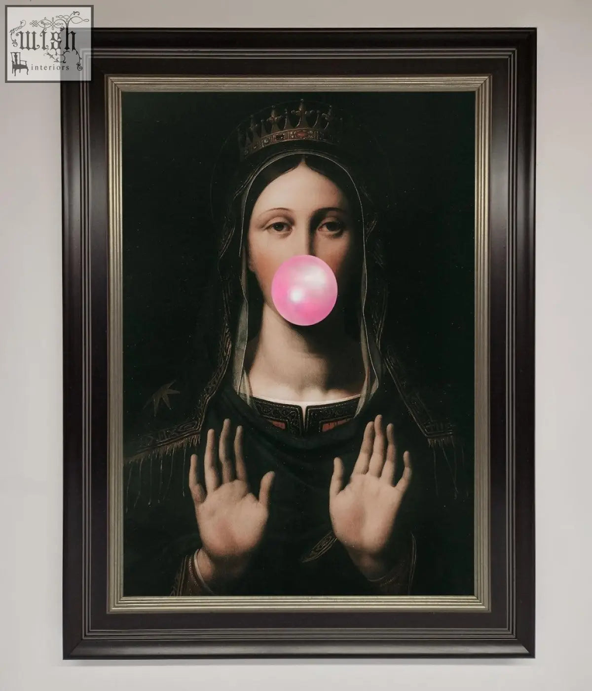 A bubble gum renaissance framed print showing a crowned dark figure blowing a bright pink bubble in an ornate brown frame