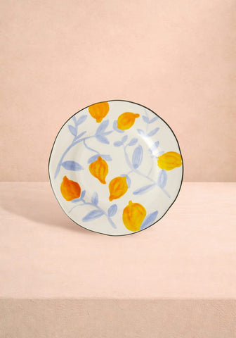 A set of 4 hand-painted ceramic lunch plates with yellow lemon patterns and light blue vines inspired by matisse