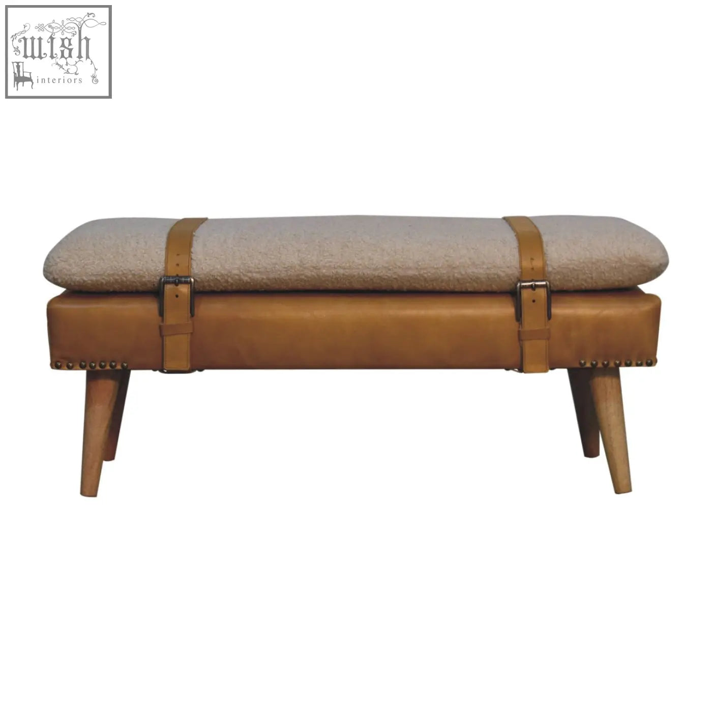 Tan leather bench with beige textured cushion and wooden legs inspired by buffalo hide olive green style
