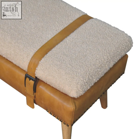 Tan leather bench with cream sheepskin cushion and brass nailhead trim for buffalo hide olive green style decor