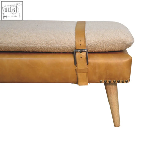 Tan leather bench with cream sheepskin cushion and wooden legs in buffalo hide olive green style