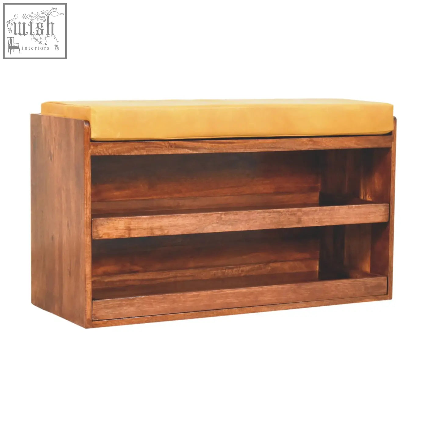 A mustard yellow cushion on a solid mango wood honey caramel shoe storage bench with pull out rustic shoe storage shelves