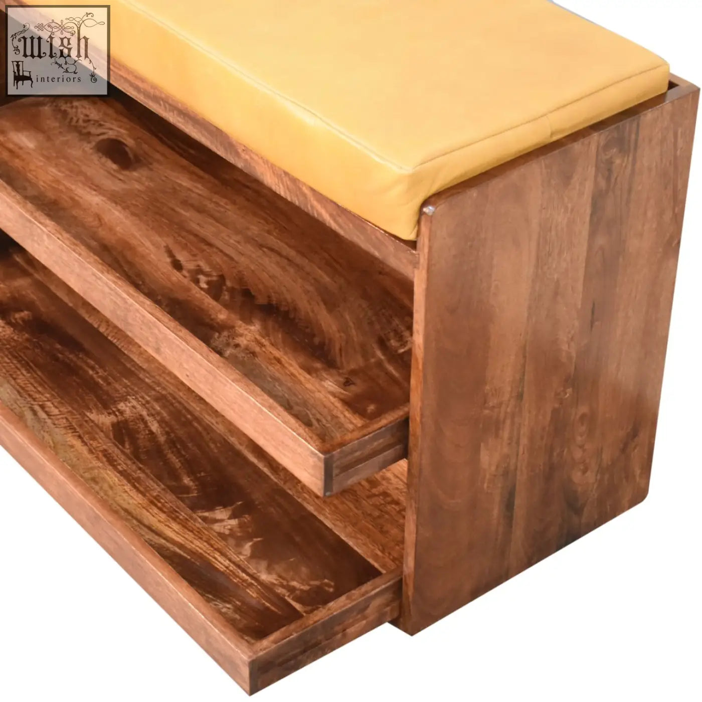 A solid mango wood shoe storage bench with mustard-yellow cushioned seat and slanted shelves for easy shoe storage