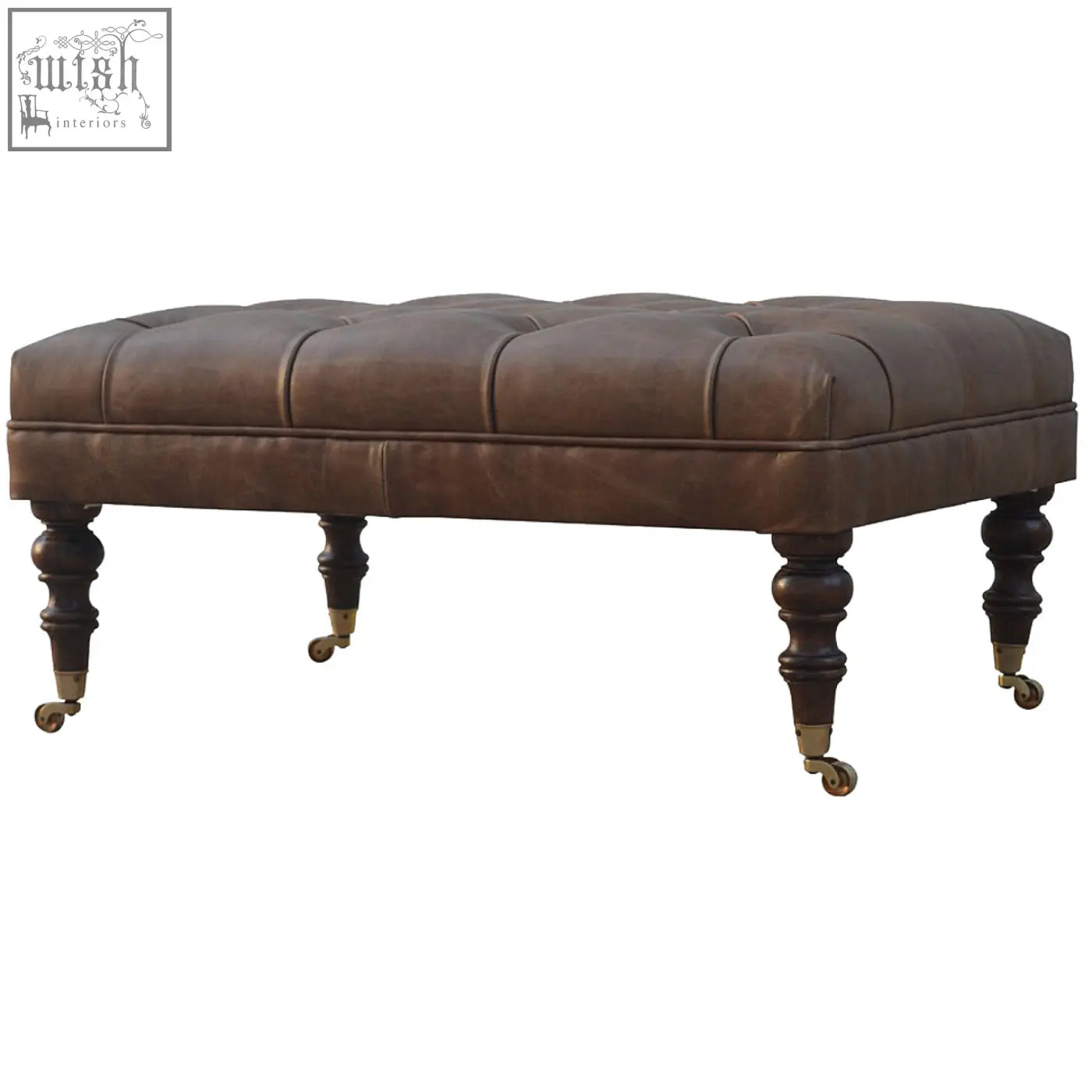 Brown rectangular buffalo leather storage bench with tufted top dark wooden legs and brass casters for additional seating