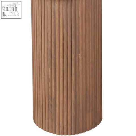 Tall cylindrical wooden pedestal side table with fluted mango wood slats and warm brown finish for natural marble display