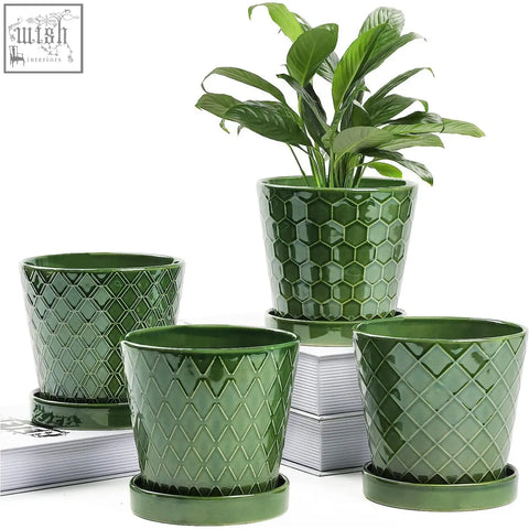 Set of three glossy forest green ceramic plant pots with drainage hole and modern striped geometric patterns with trays