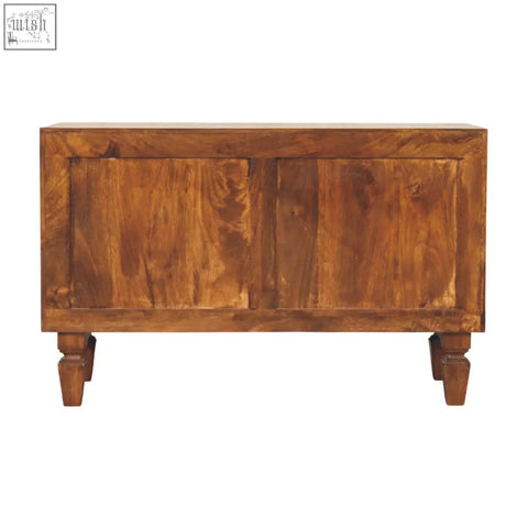 Warm-toned wooden cadiz carved shoe bench with two paneled doors and turned legs for stylish storage
